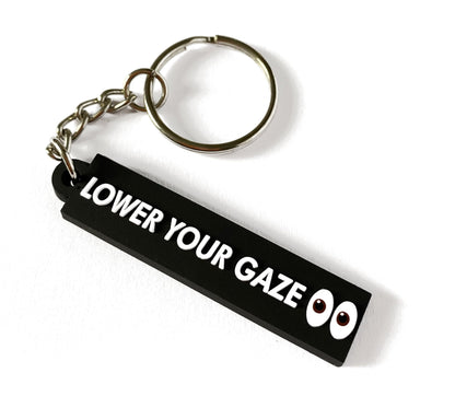 Lower your gaze sleutelhanger disponible chez Al - imen